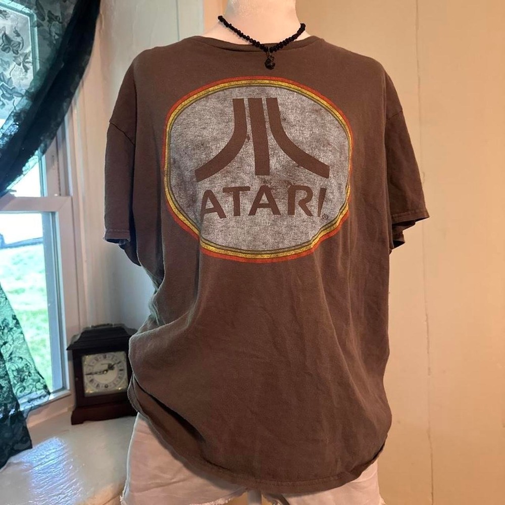 Atari graphic tee in a faded gray color